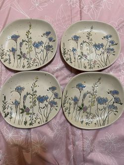 Set of 4 small ceramic floral dishes/trays