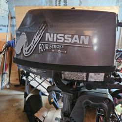 Four Stroke Four Horse Nissan Motor With Boat And Trailer