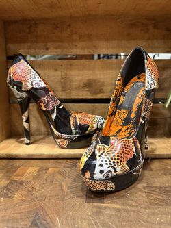 Retired Iron Fist Black and Orange Fish Print Heels