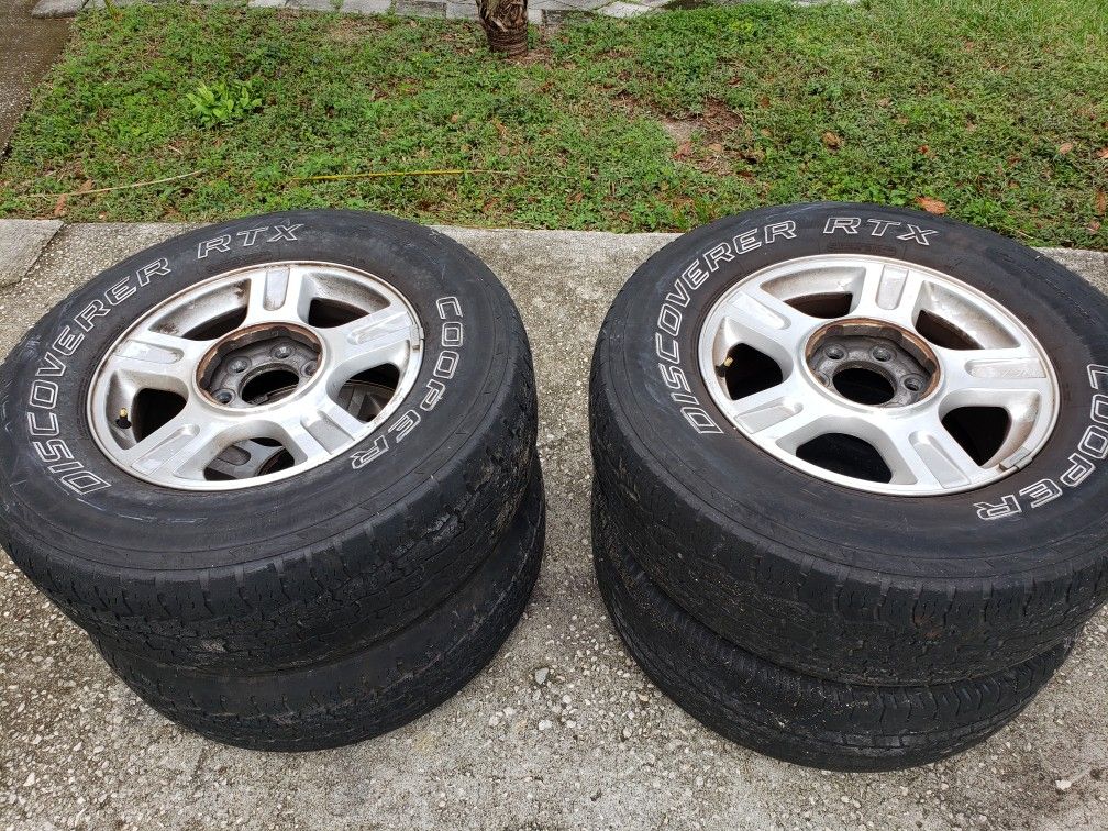 4 - tires 265 x 70R17 with rims for ford expedition. $75.00