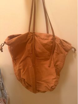 Handmade tan bag with leather straps