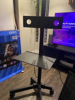 TV Stand Rollable (Holds Televisions up to 50 inches) Has Wheels
