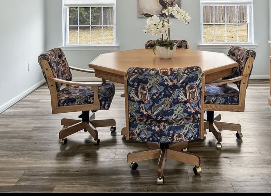 Versatile poker/game table with 4 “rock and roll” chairs 