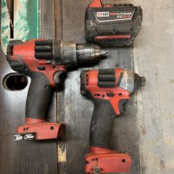 Milwaukee M18 Fuel Drills 5.0 Battery & Charger. 