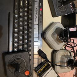 Atari 1200xl Games, Basketball, Moon, Patrol, Schubert, Four Controllers, Fogger, Plug-In, And Attachment To Tv.