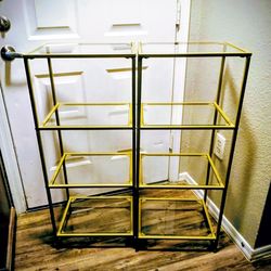 Free standing gold and glass shelves
