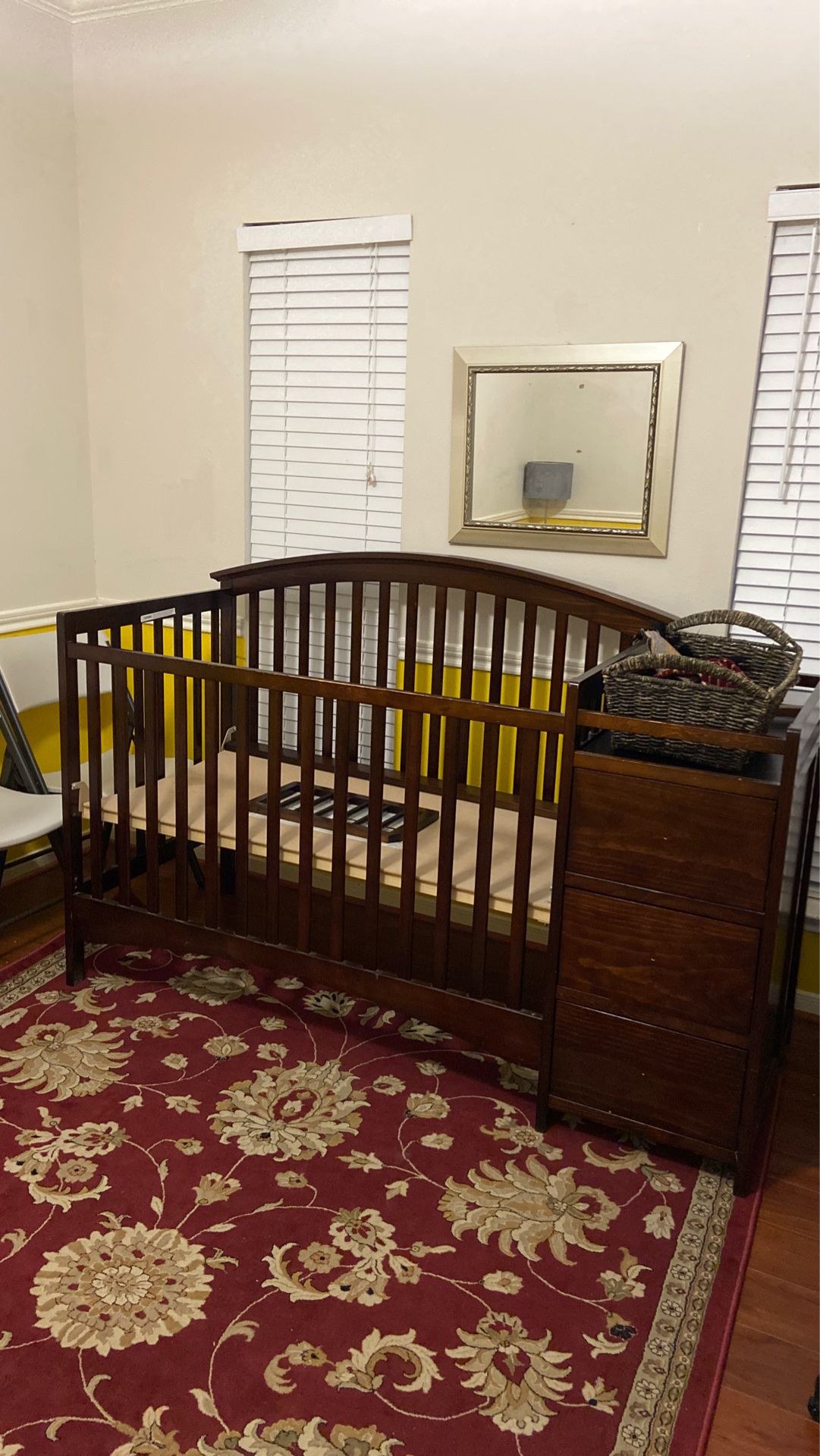 Baby crib with changing table