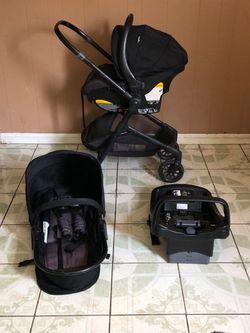 LIKE NEW EVENFLO PIVOT MODULAR TRAVEL SYSTEM STROLLER CAR SEAT AND BASSINET 3 IN 1