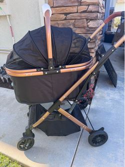 Pet Stroller for Cat and Dog, bassinet detaches for car seat travel. Folds down. Brand new