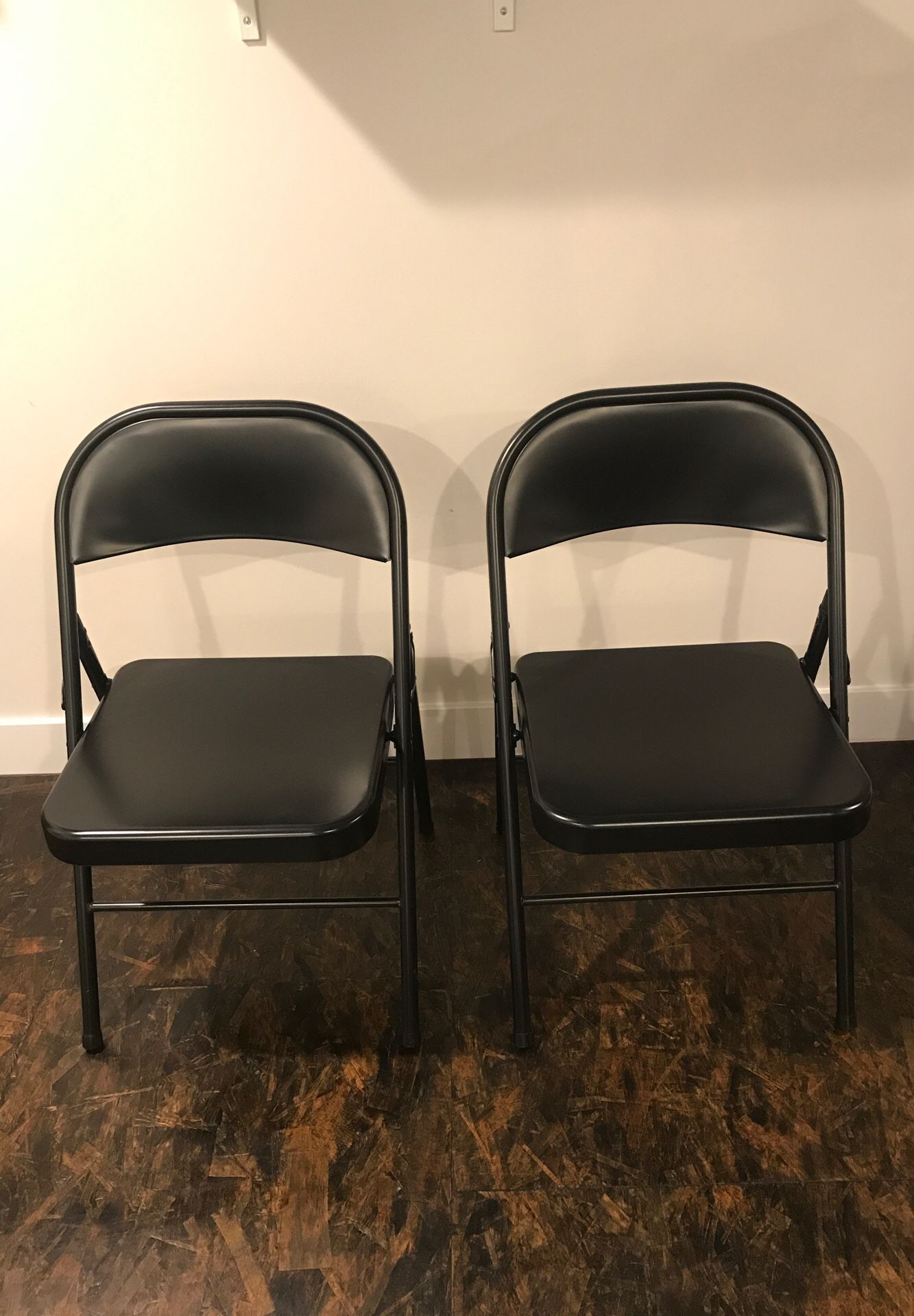 2 metal folding chairs