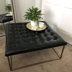 Leather ottoman coffee table with gold metal frame 