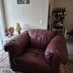 All leather burgundy living room/Bedroom broilhill