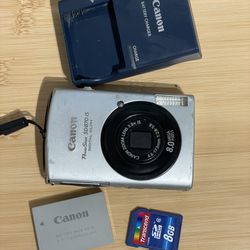 Canon Powershot SD870 IS ELPH Digital Camera - Tested Works  Flash zoom video photo all working. Charger, battery and memory card included. Has cosmet