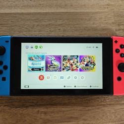 Nintendo Switch With 4 Controllers And Dock