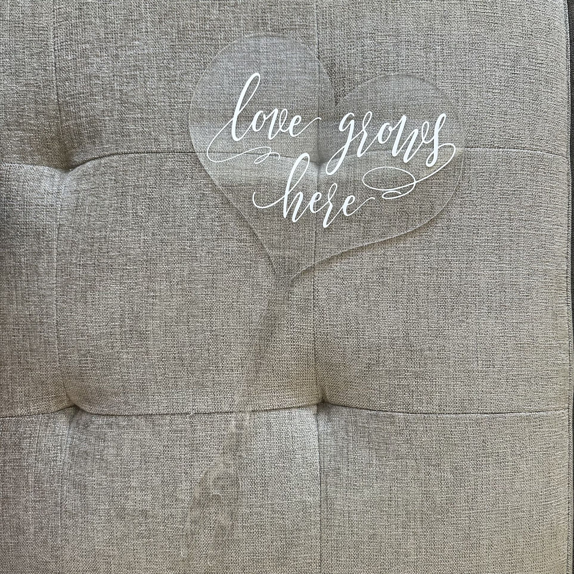 Acrylic “Love Grows Here” Cake Topper