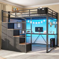 Loft bed with stairs and desk underneath