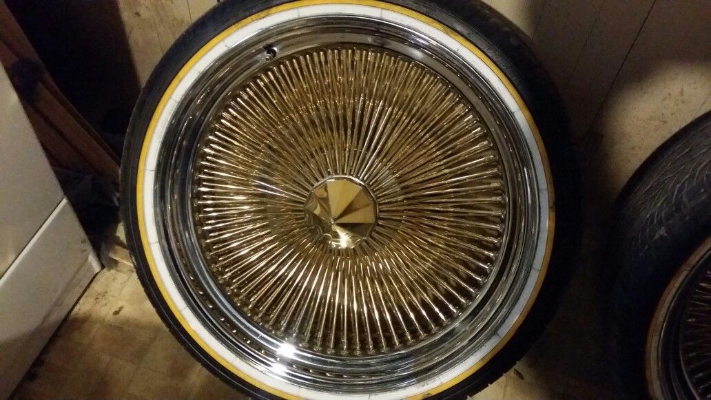 22inch vogue tires and gold and chrome Dayton style wire rims