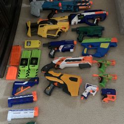 Nerf Guns + Darts