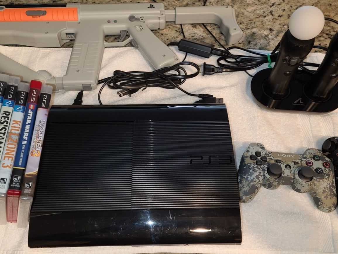 Play Station PS3 Slim With Games & Extras