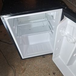 Amazingly cold mini fridge  27 inches high 27 inches wide