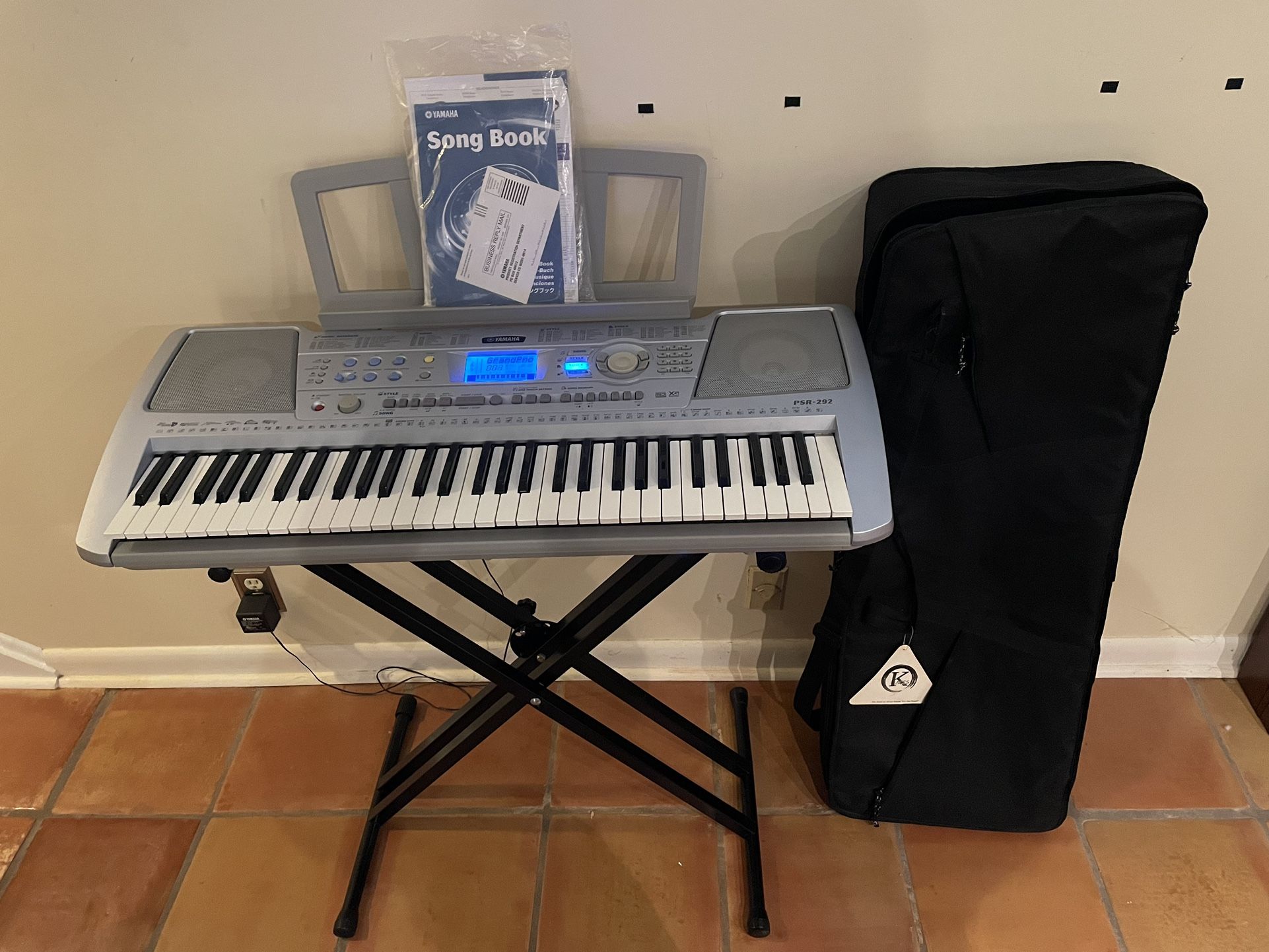 Yamaha PSR-292 Portatone Electronic Keyboard/Piano with 61 keys, Stand, Power Cord, Owner’s Manual, Songbook, and “Kaces” Travel Bag Included!