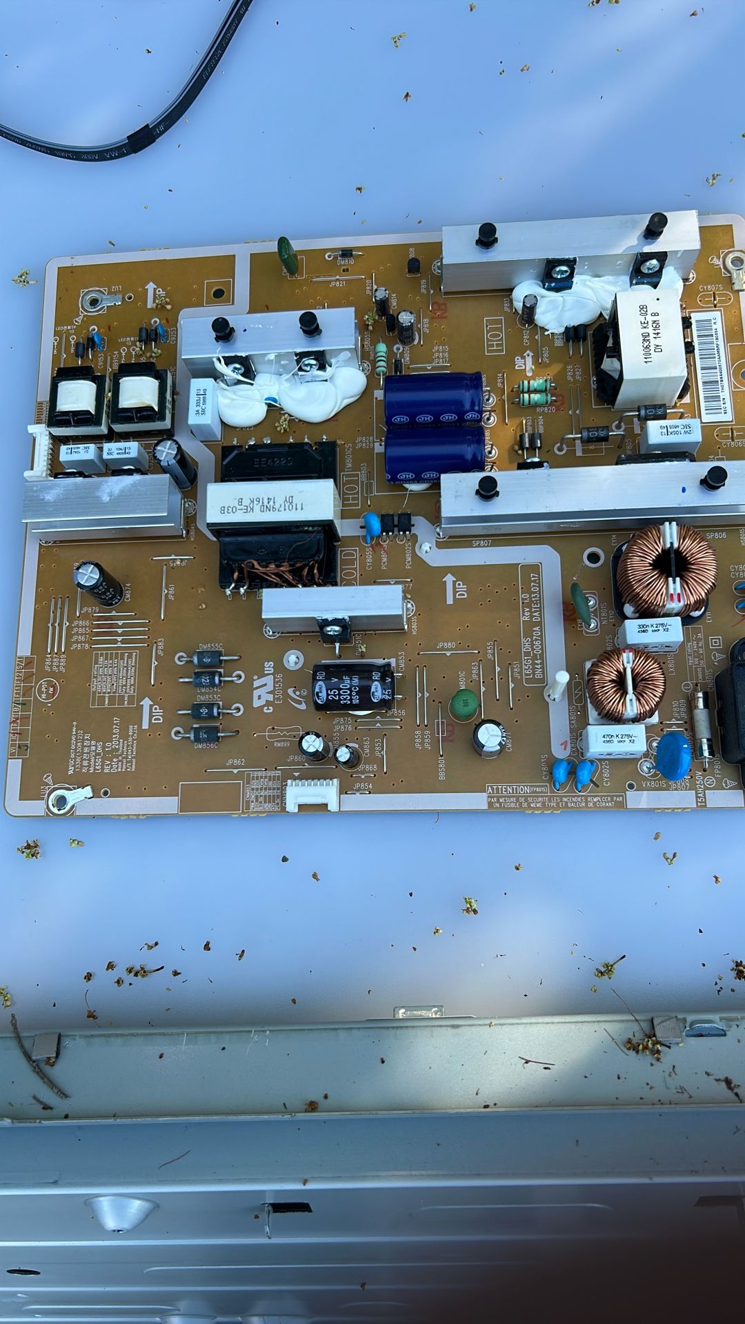 Samsung BN44-00670A power supply board, also known as the L65G1_DHS board.