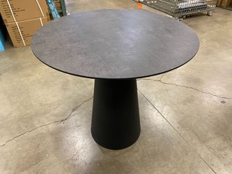 Petite Modern Round Black Dining Table with Textured Top and Conical Pedestal Base