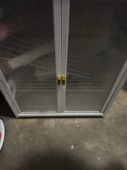 Gray Cabinet with Glass Panel Doors