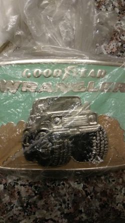 1988 Good year wrangler belt buckle from 1988 in Good shape still in plastic.