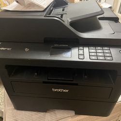 Printer Brother brand. New. Scanner doesn’t work it is jammed but printer works