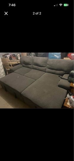 Couch with pull out bed and storage