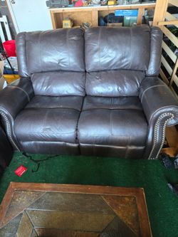 Leather reclining love seat couch
