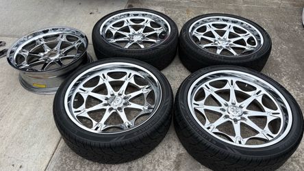 28 INCH WEST COAST CHOPPERS 8 LUG RIMS AND TIRES.
