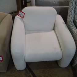 Thought process Thought process Swivel Accent Chair — (Tan)  Spin, sink, relax. This tan swivel accent chair pairs a low, square track-arm silhouette 
