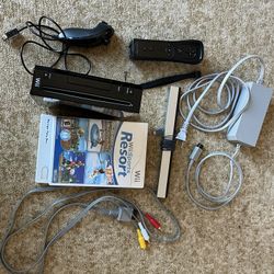 Nintendo Wii with Remote + Nunchuck And Wii Sports Resort + New Super Mario Bros Wii