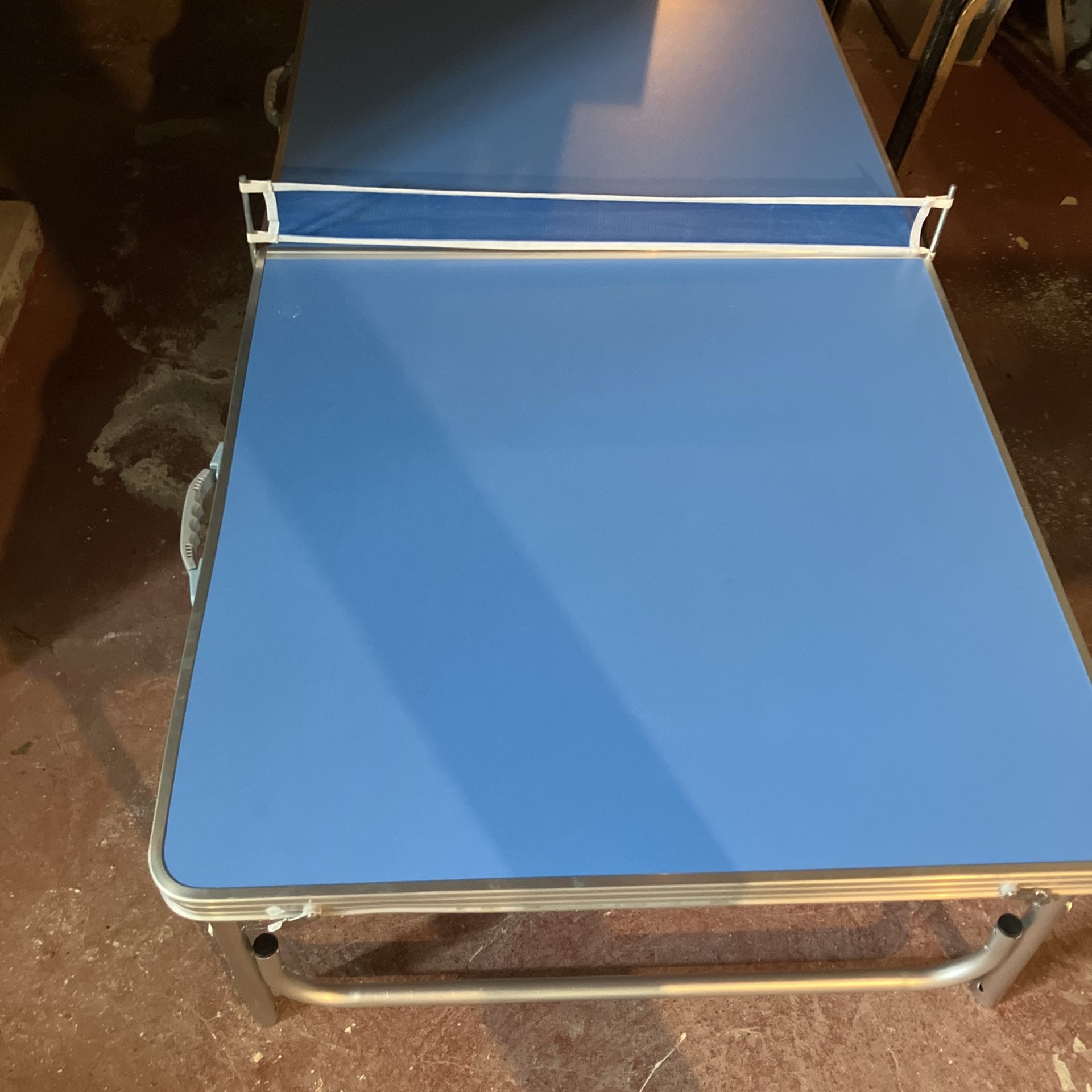 Four lightweight aluminum ping-pong table 2’ x 5’ and 3 feet tall no ping-pong, balls or paddles