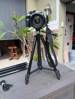 Canon EOS DSLR Camera with Tripod