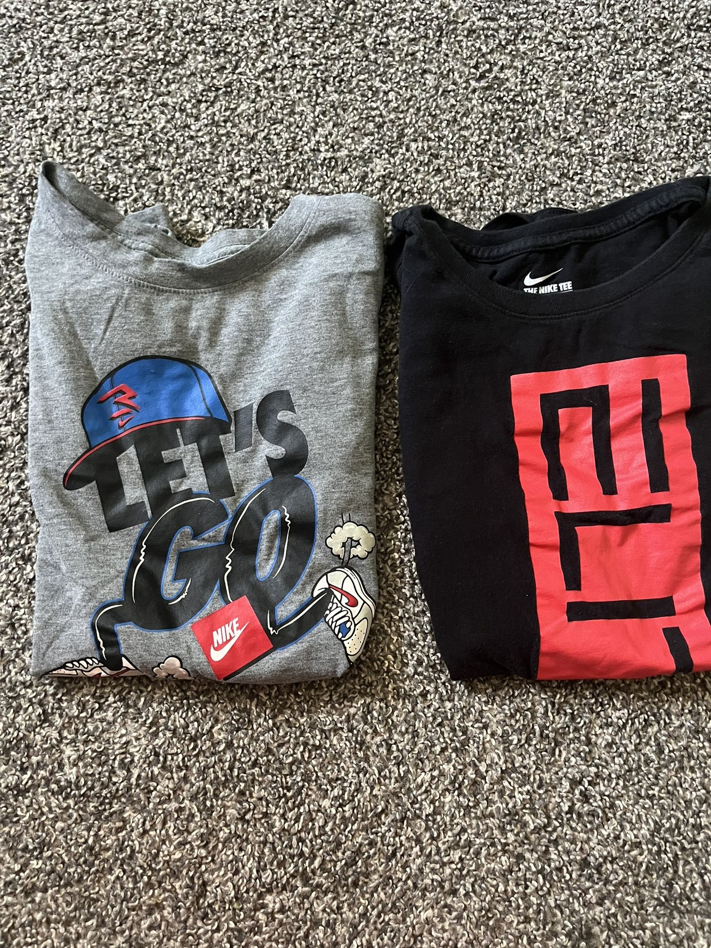 Two Nike Shirts