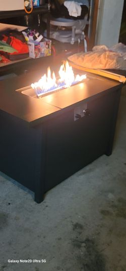 Brand New 43" Propane Fire Pit Table. 4 Brand new chair's.