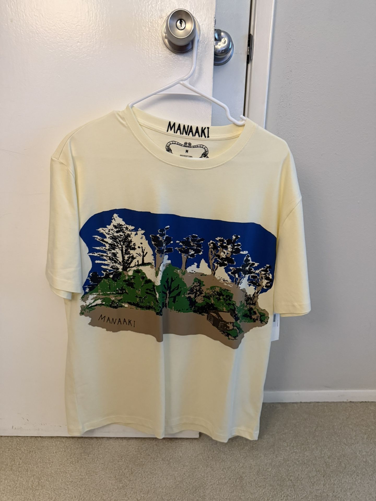 Manaaki Graphic T-Shirt in Cream and Blue