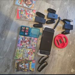 Nintendo Switch Oled with Dbrand Skin + Games