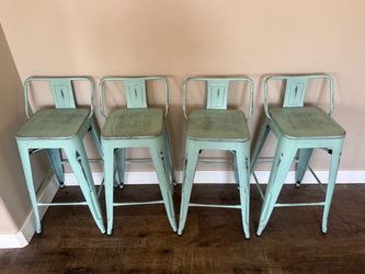 Four counter height barstools