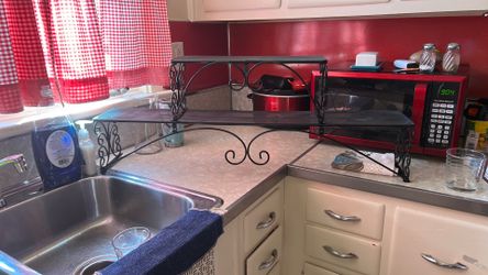 2 tier plant stand over the sink stand