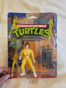 Vintage 1988 April O'Niel 10-back. MOC