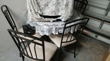 Breakfast table with four chairs