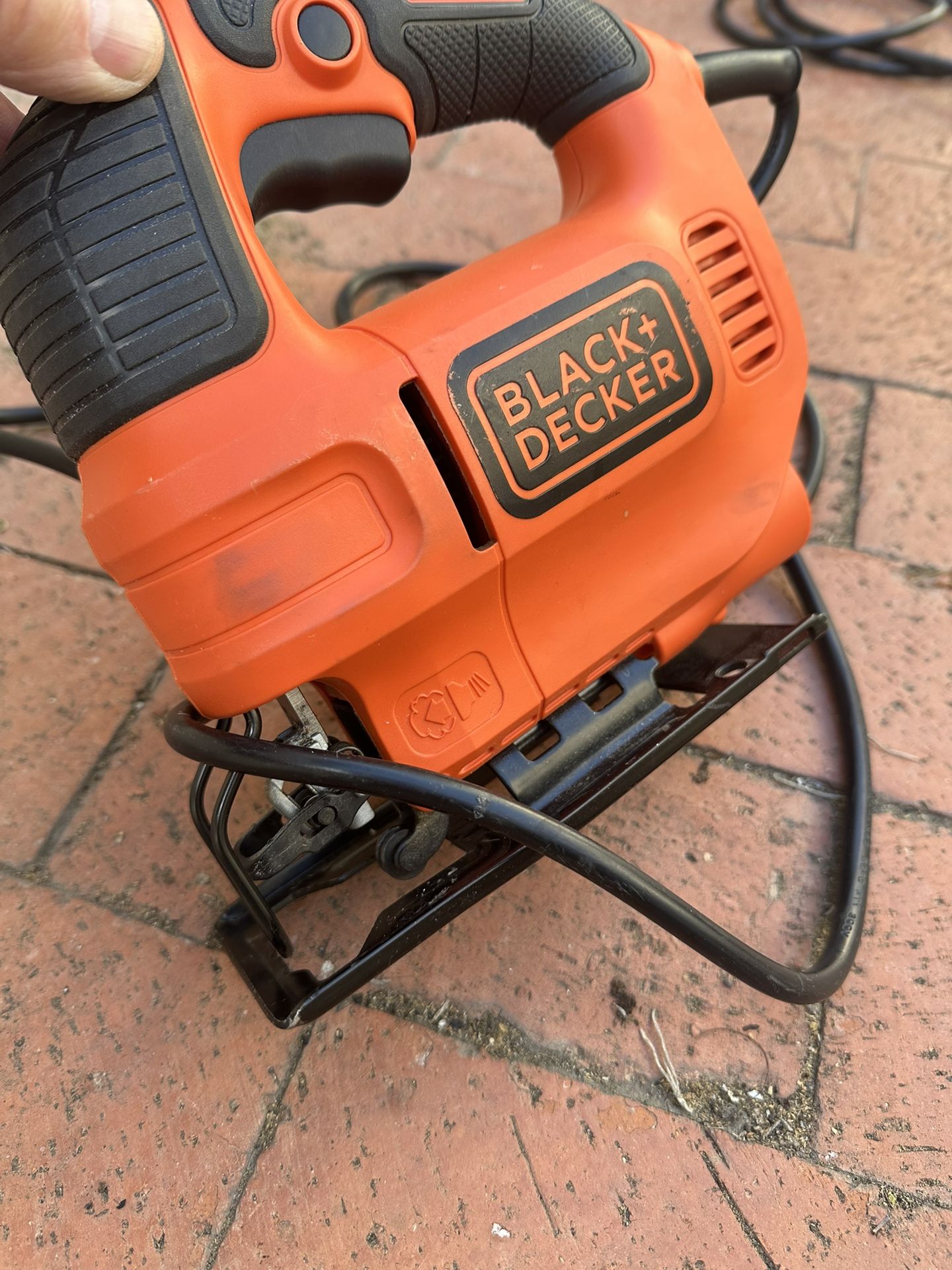 Black and Decker Jigsaw with assorted saw blade.