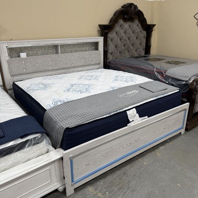 ALTYRA WHITE UPHOLSTERED BOOKCASE LED QUEEN PANEL BED