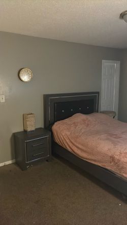 Queen size bed , dresser with mirror and nightstand