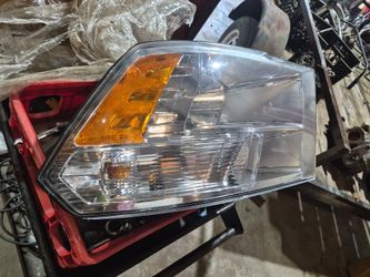 Mopar passenger headlight for 2009-2018 RAM Truck. OEM Mopar Light. Used but Excellent Condition