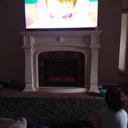 Fireplace /65" Roku TV
